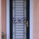 Teralis Pintu Besi Tempa